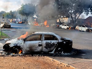 South Africa protests turn violent amid rage over asylum ruling