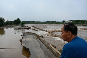 Heavy rains, flooding kill at least 30 in Beijing as downpour continues
