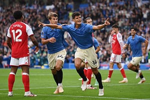Brighton beat Arsenal 3-0 as Man City top Premier League without playing