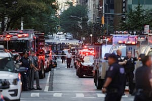Four killed in New York shooting, including police officer, suspect: Report