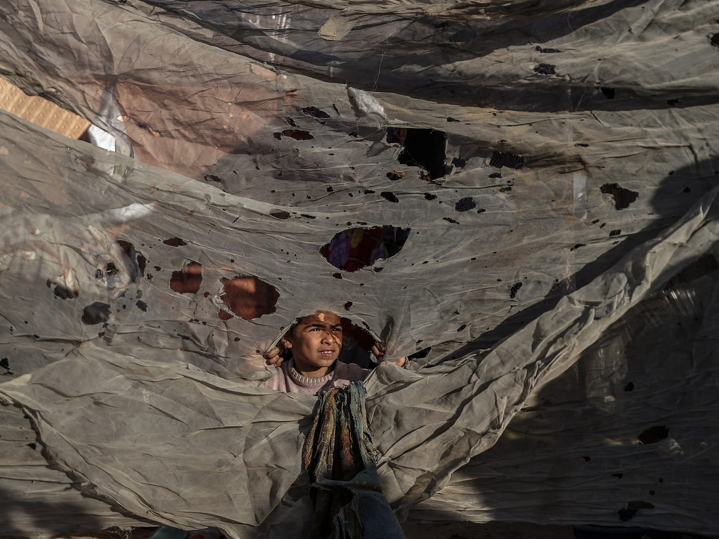 Dozens killed in Israeli attacks on Gaza’s tent camps for displaced people
